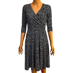 White House BM fit and flare polka dot dress.
